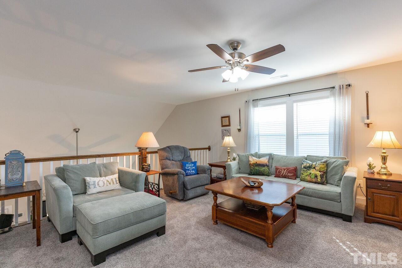 3508 Jones Lake Road Fuquay-Varina, NC 27526 - Photo 17 of 41 a living room with furniture
