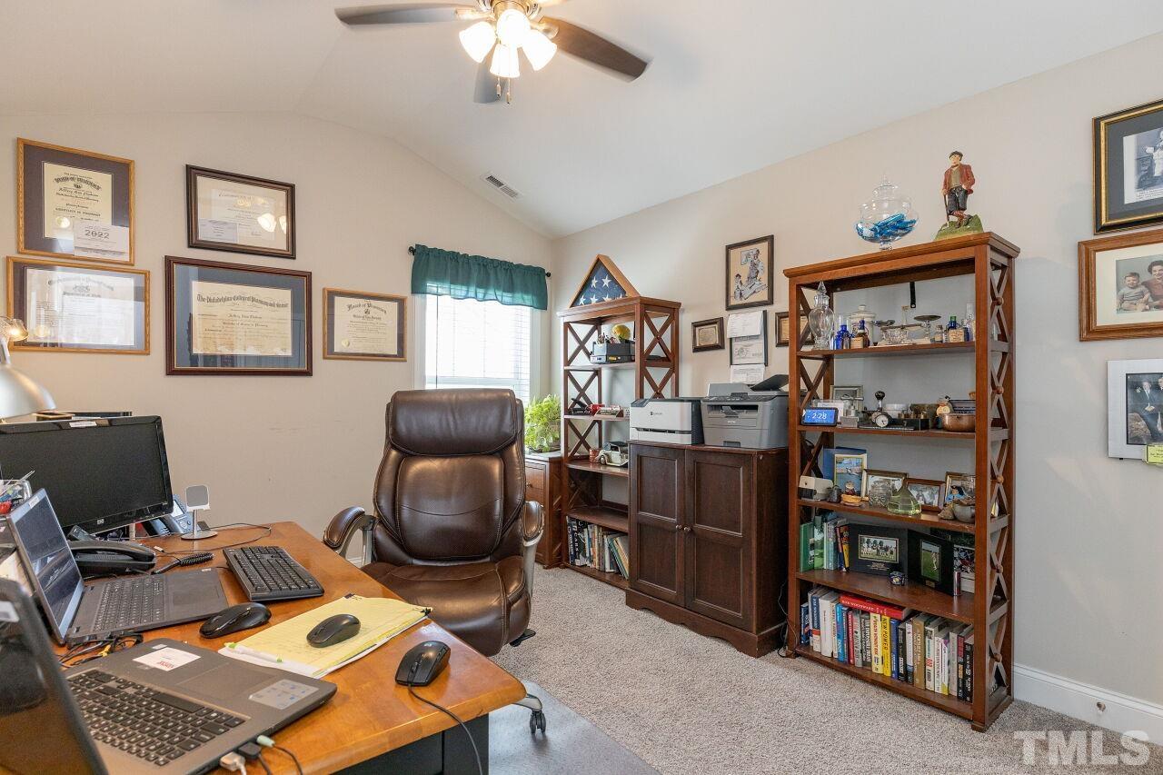 3508 Jones Lake Road Fuquay-Varina, NC 27526 - Photo 23 of 41 a work room with furniture and a window