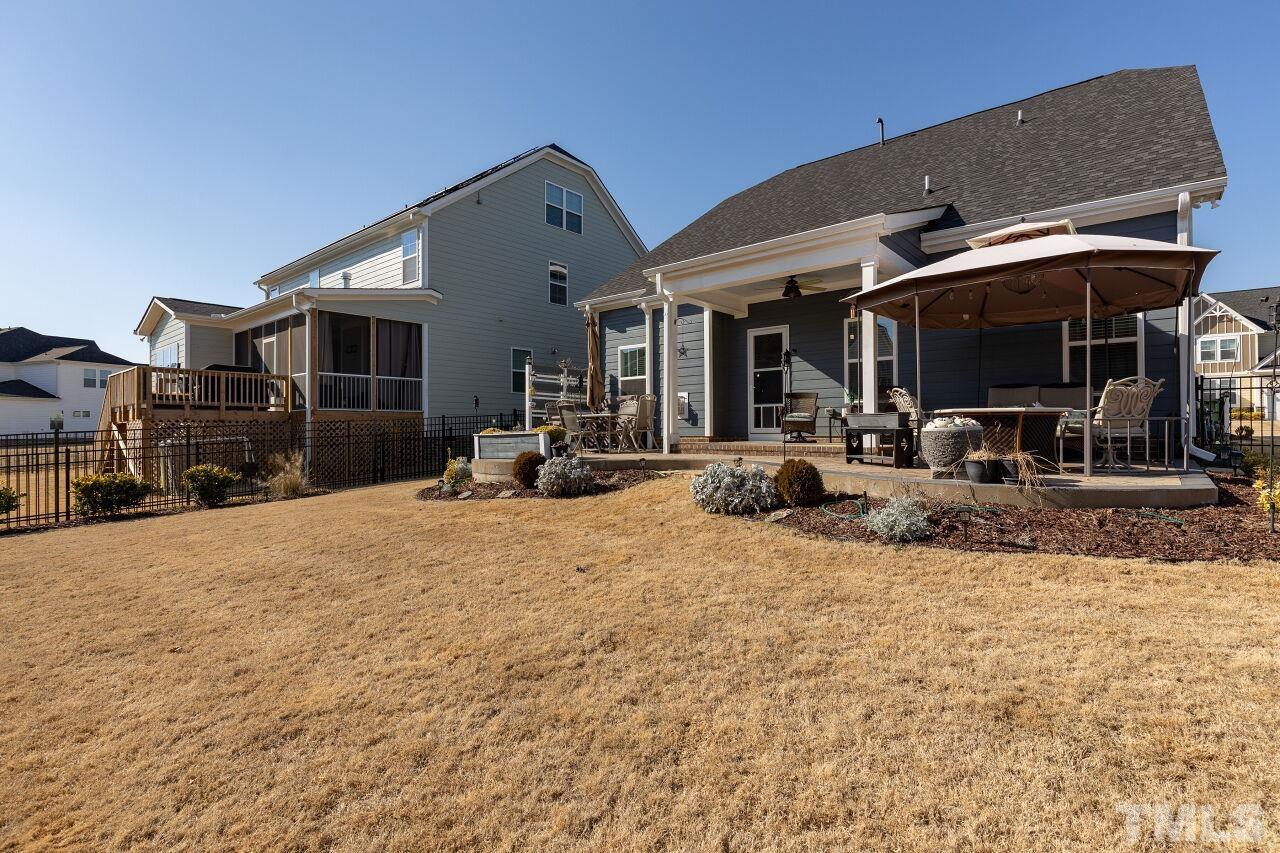 3508 Jones Lake Road Fuquay-Varina, NC 27526 - Photo 28 of 41 a view of the front of house with a patio