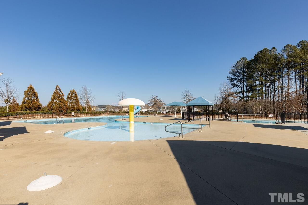 3508 Jones Lake Road Fuquay-Varina, NC 27526 - Photo 41 of 41 a view of a swimming pool with an outdoor seating