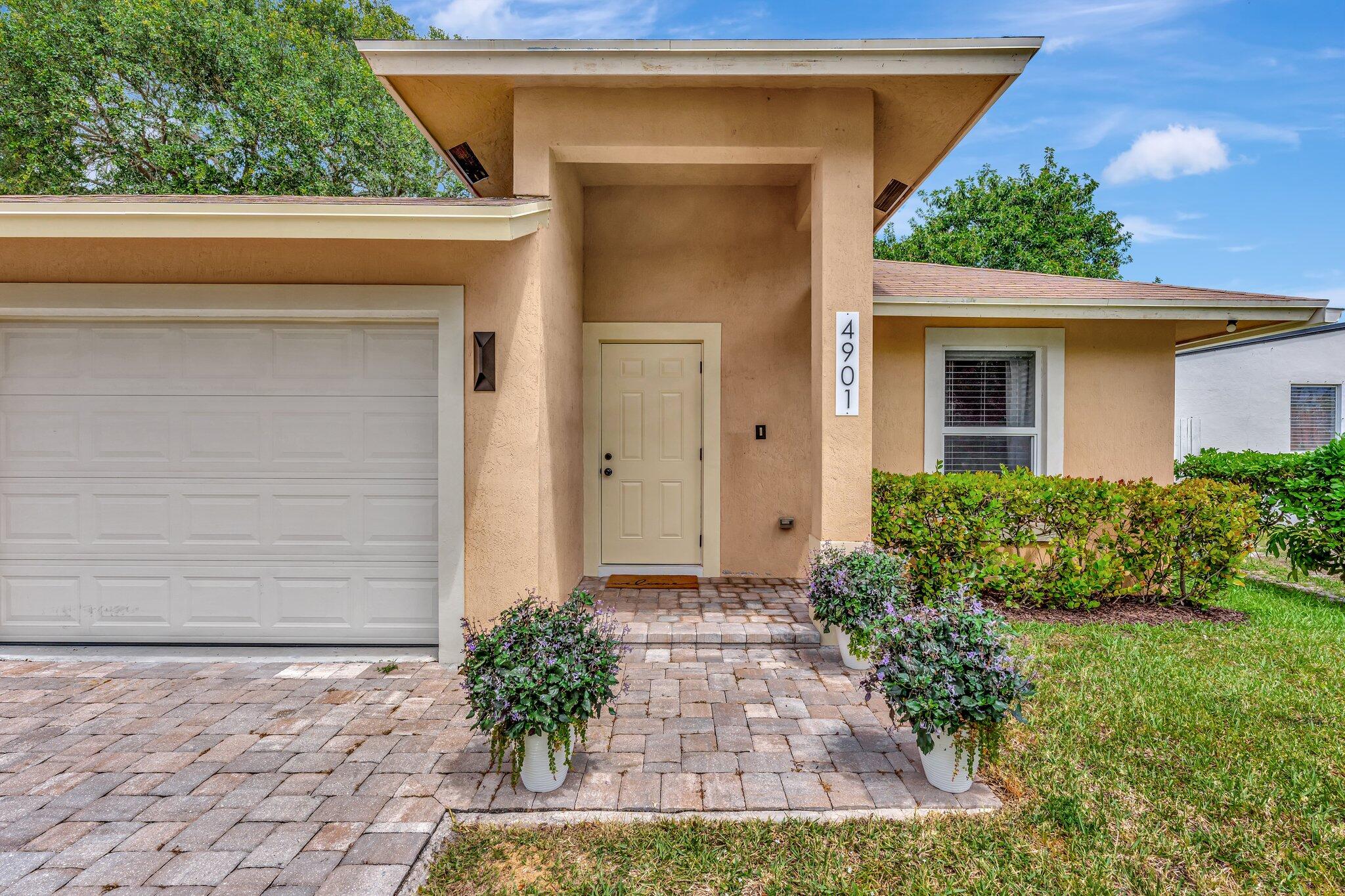 4901 Lincoln Road Delray Beach, FL 33445 - Photo 3 of 56 a view of a house with a yard