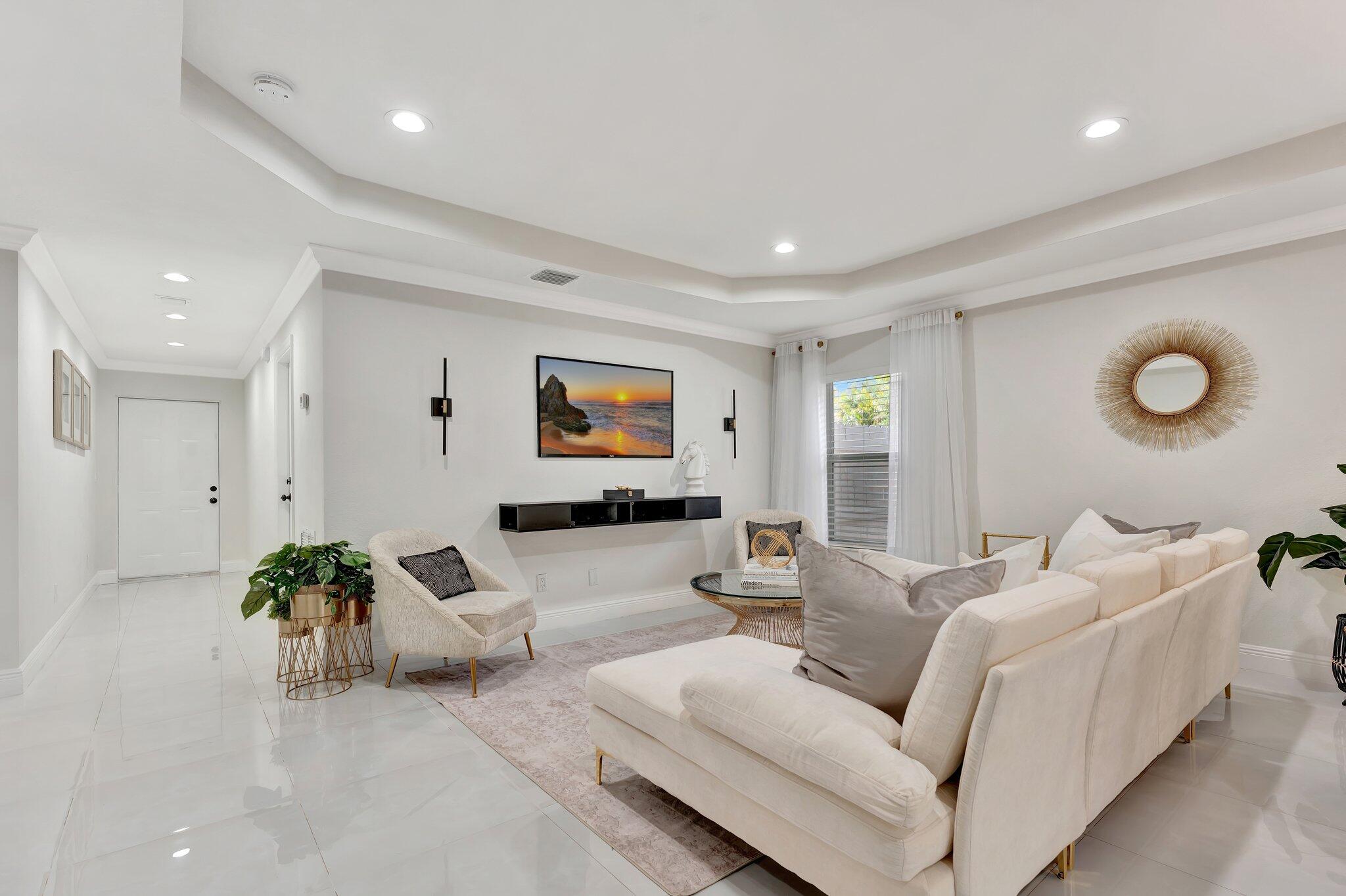 4901 Lincoln Road Delray Beach, FL 33445 - Photo 8 of 56 a living room with furniture