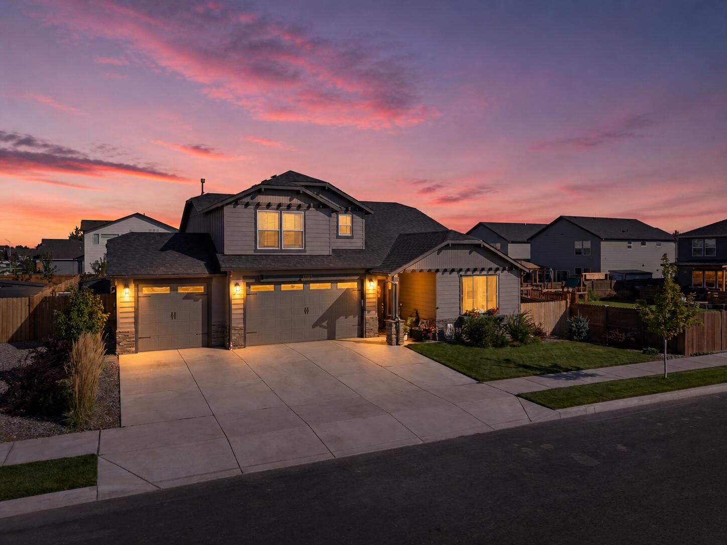 3370 Northwest 15th Street Redmond, OR 97756 - Photo 1 of 27 a front view of a house with a yard