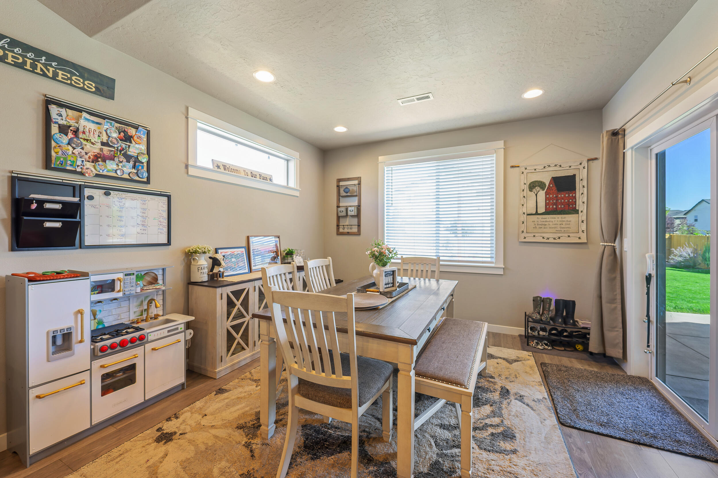 3370 Northwest 15th Street Redmond, OR 97756 - Photo 17 of 27 a view of a dining room with furniture and a window