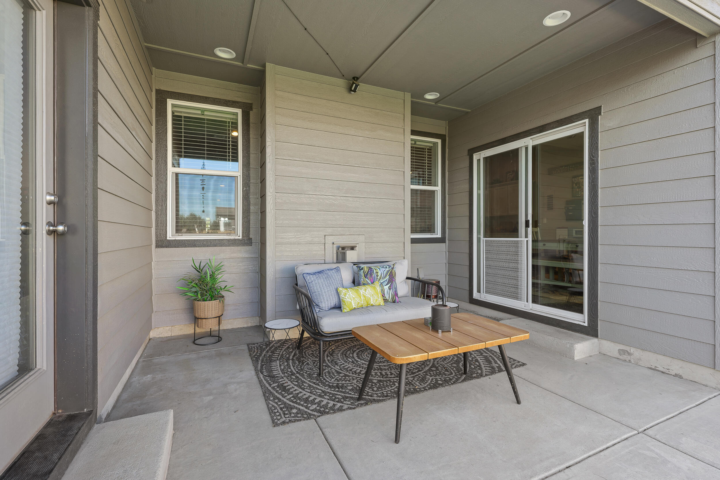 3370 Northwest 15th Street Redmond, OR 97756 - Photo 22 of 27 a outdoor space with a couch and a potted plant