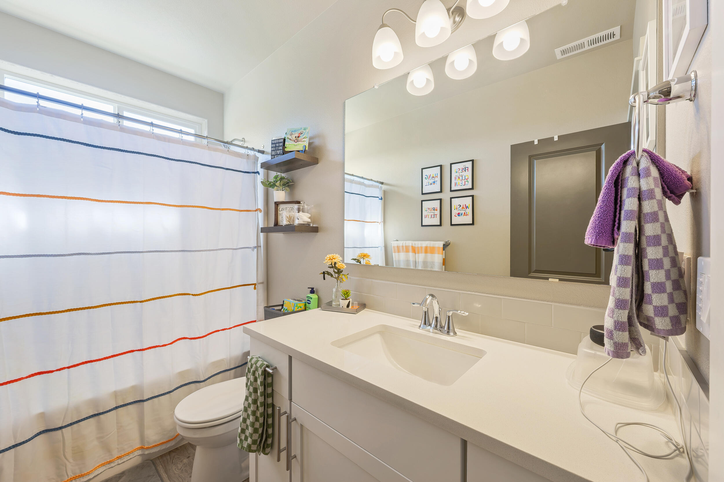 3370 Northwest 15th Street Redmond, OR 97756 - Photo 5 of 27 a bathroom with a sink and a mirror