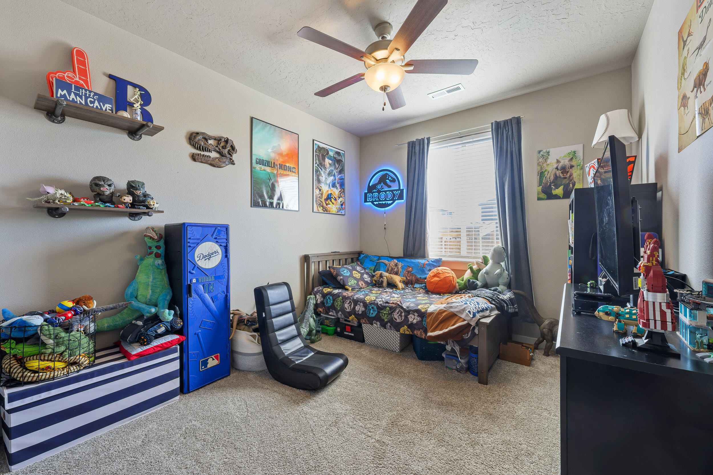 3370 Northwest 15th Street Redmond, OR 97756 - Photo 7 of 27 a bedroom with lots of furniture and toys