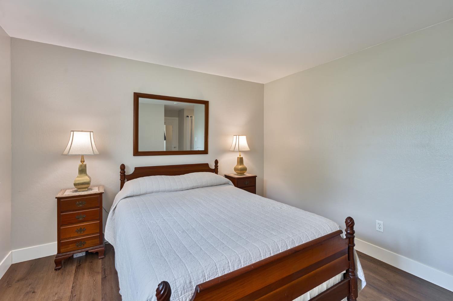 5422 Earnell Street Carmichael, CA 95608 - Photo 21 of 39 a bedroom with a bed and a table