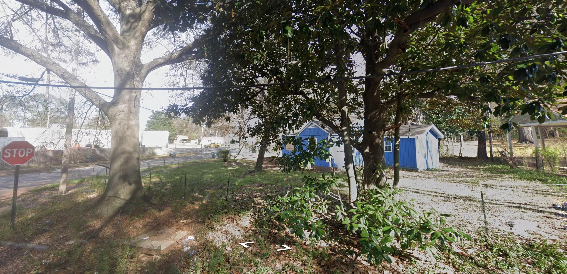4696 Dalton Road Memphis, TN 38109 - Photo 7 of 10 View of yard featuring a shed