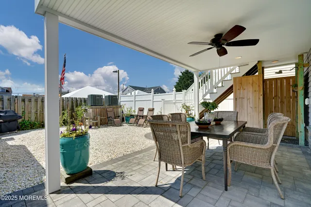 a view of a livingroom with furniture and window