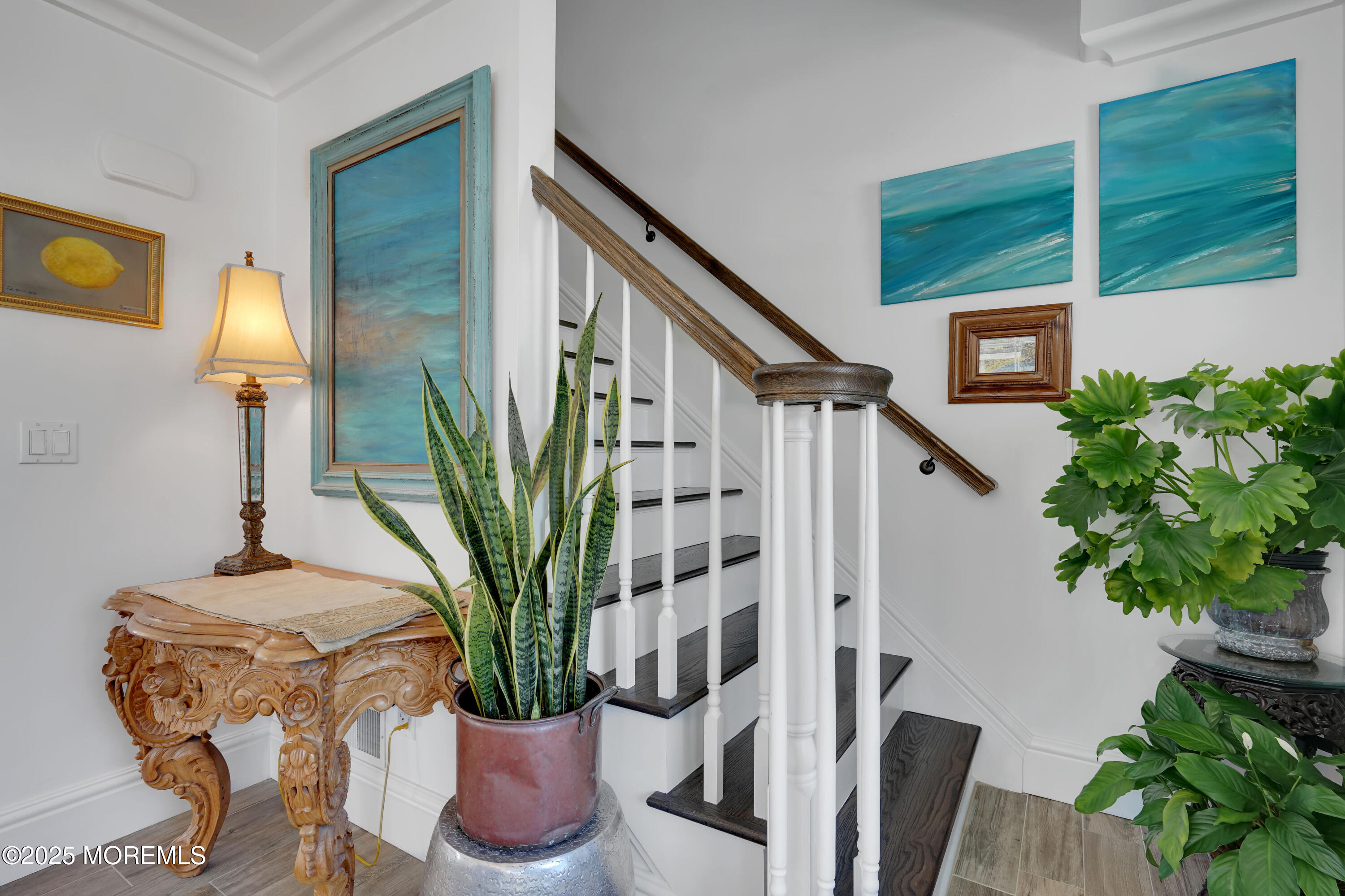 229 1st Avenue Manasquan, NJ 08736 - Photo 14 of 32 a view of potted plant in front of a door