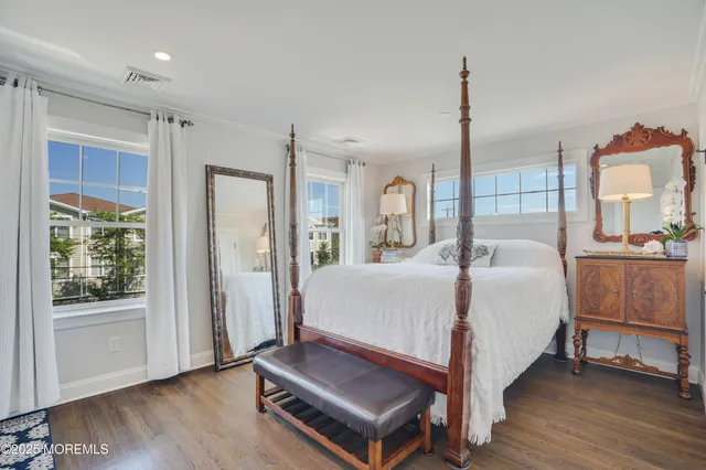 a bed room with a bed and a window