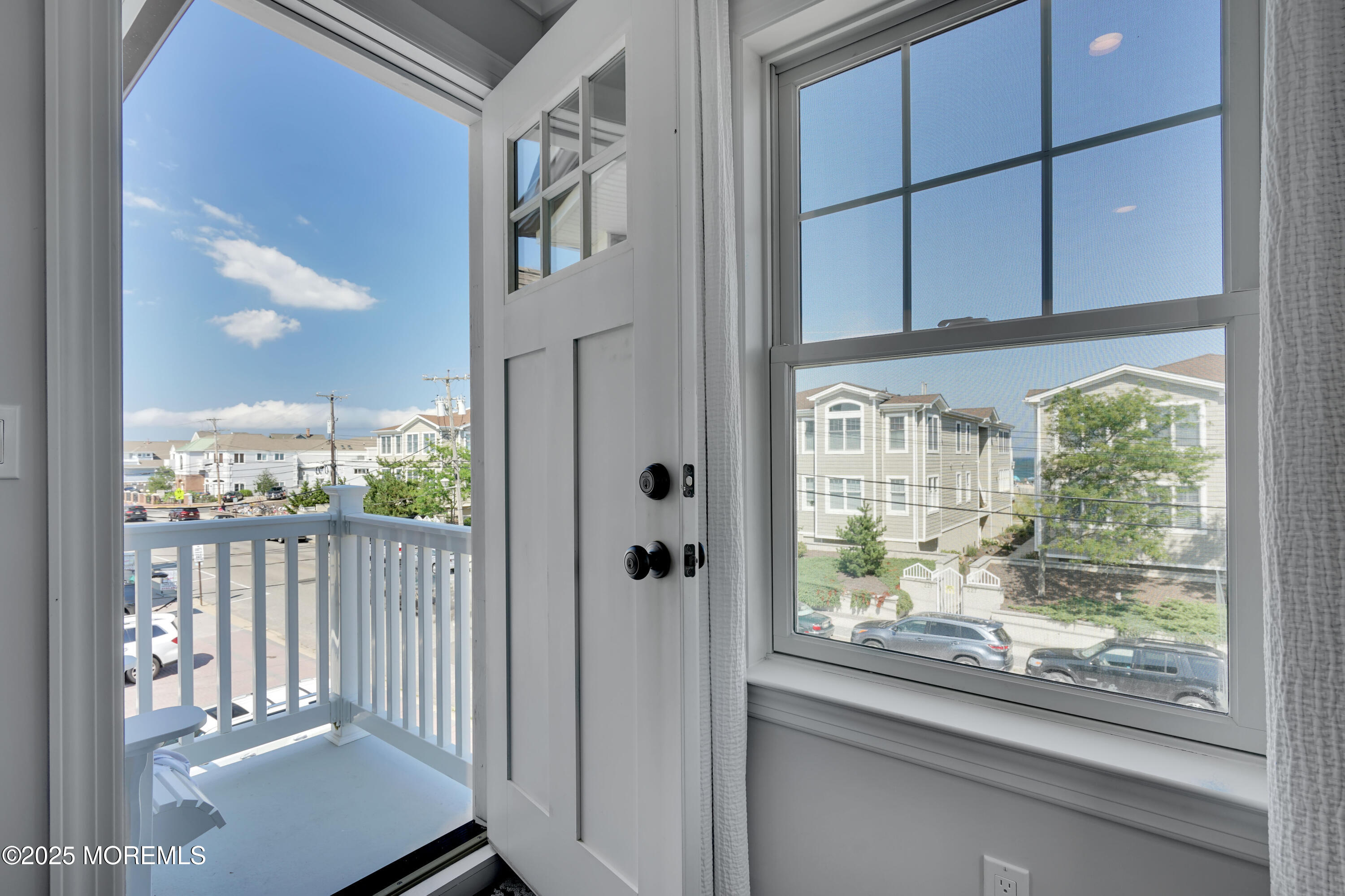 229 1st Avenue Manasquan, NJ 08736 - Photo 16 of 32 a view of a entrance door of the house