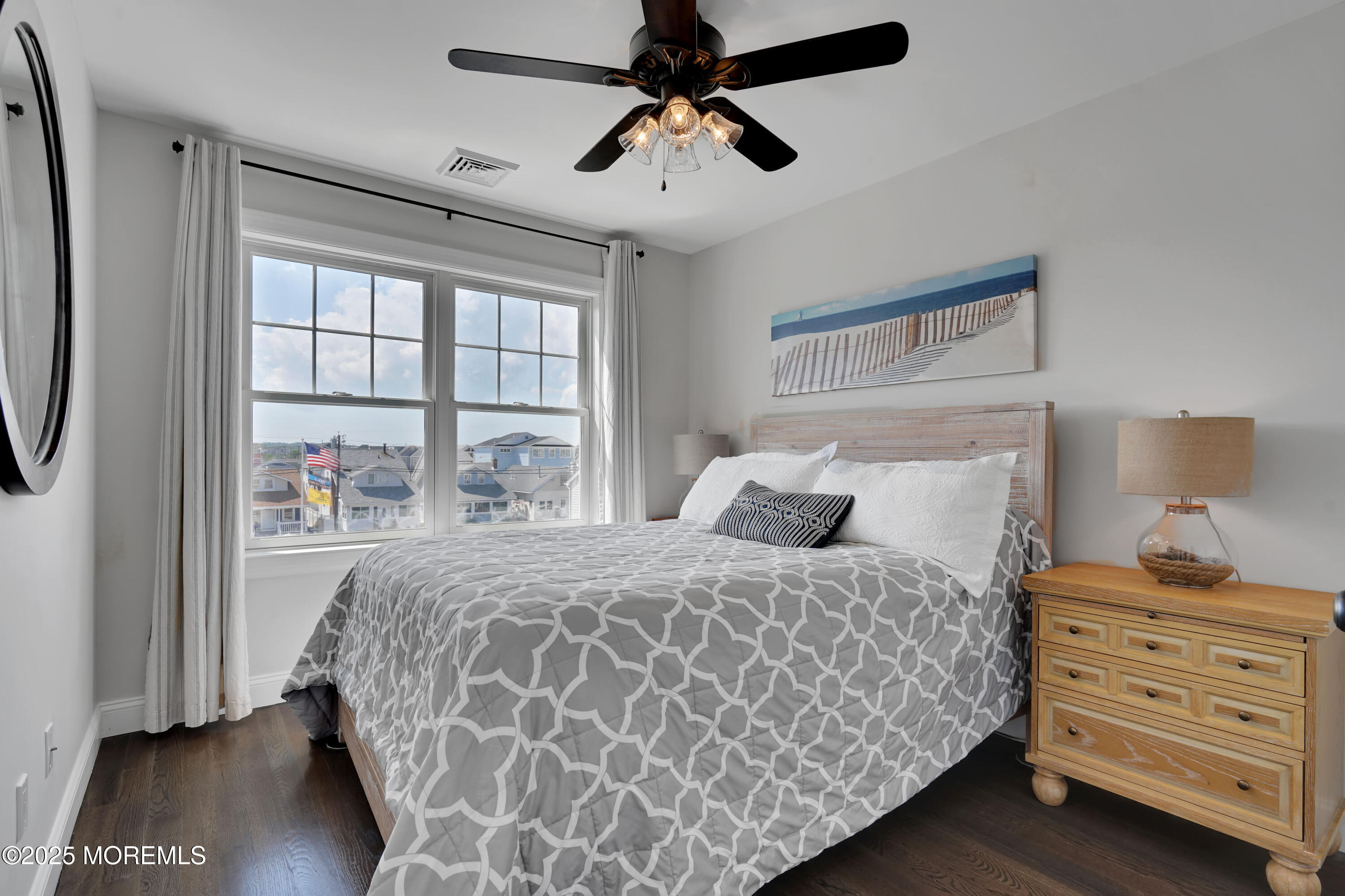 229 1st Avenue Manasquan, NJ 08736 - Photo 24 of 32 a bedroom with a bed and a window