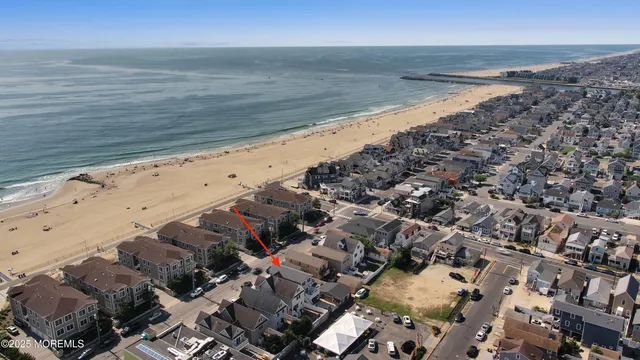 a view of hallway with wooden floor