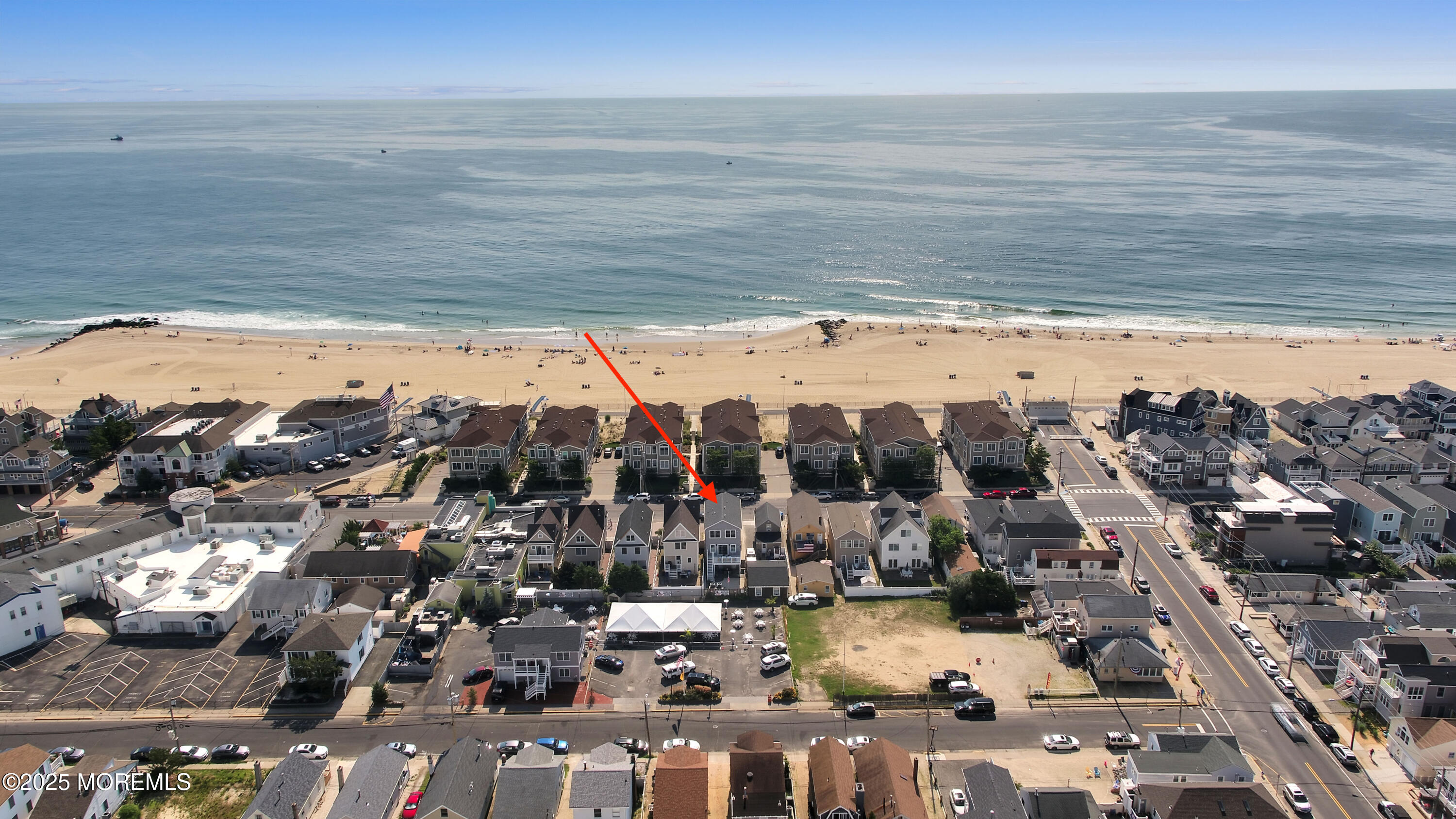 229 1st Avenue Manasquan, NJ 08736 - Photo 3 of 32 a view of ocean and a city
