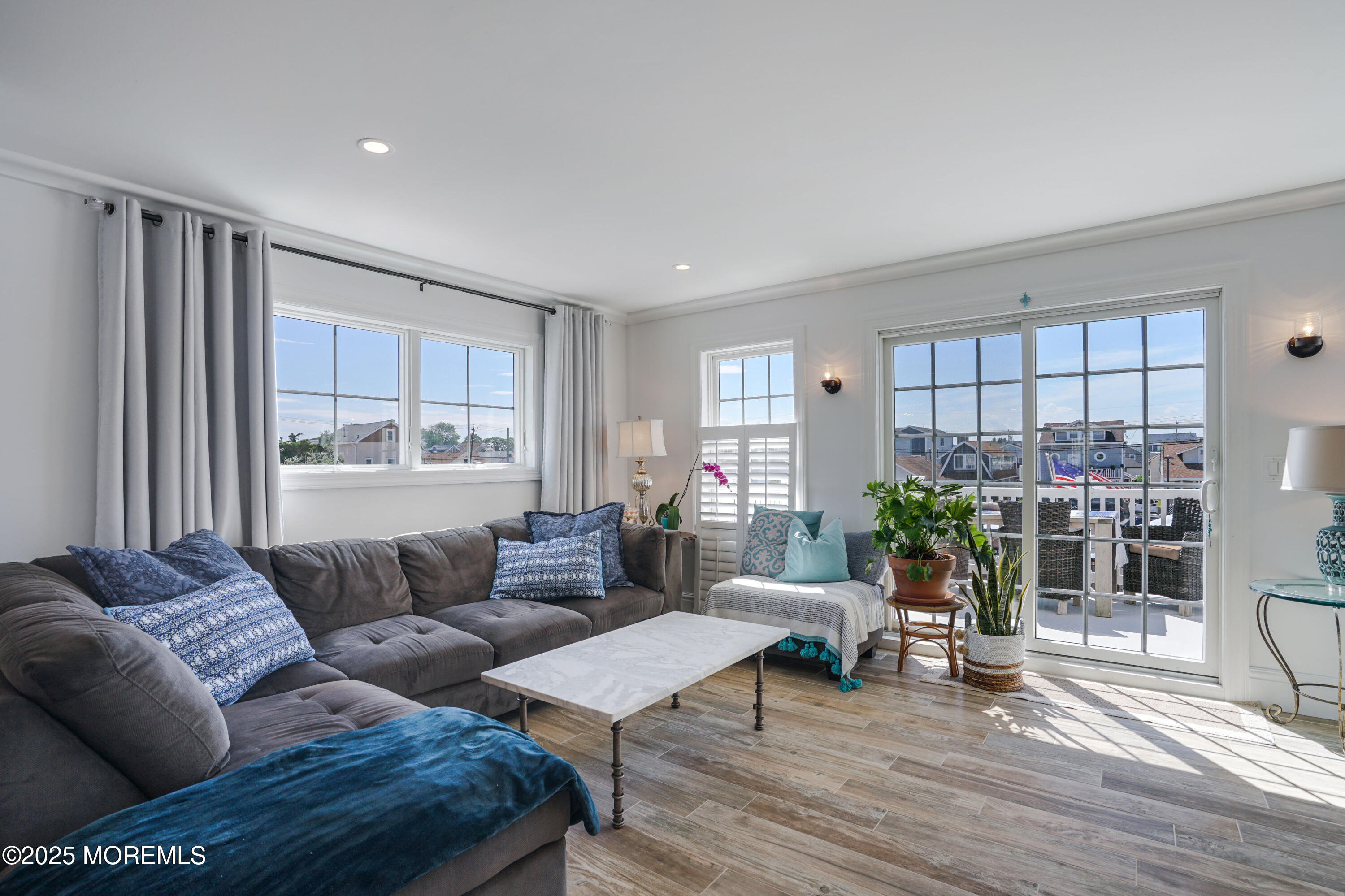 229 1st Avenue Manasquan, NJ 08736 - Photo 10 of 32 a living room with furniture and wooden floor