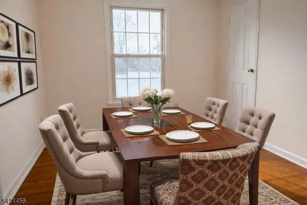 a view of a dining room with furniture