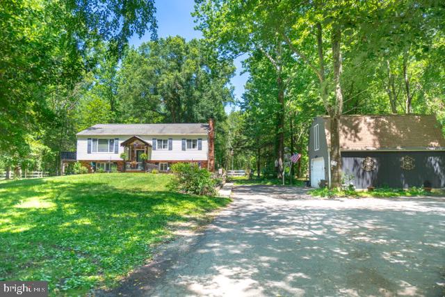 29 Friendship Road Southampton, NJ 08088 - Photo 2 of 28 Charming home nestled in lush greenery.
