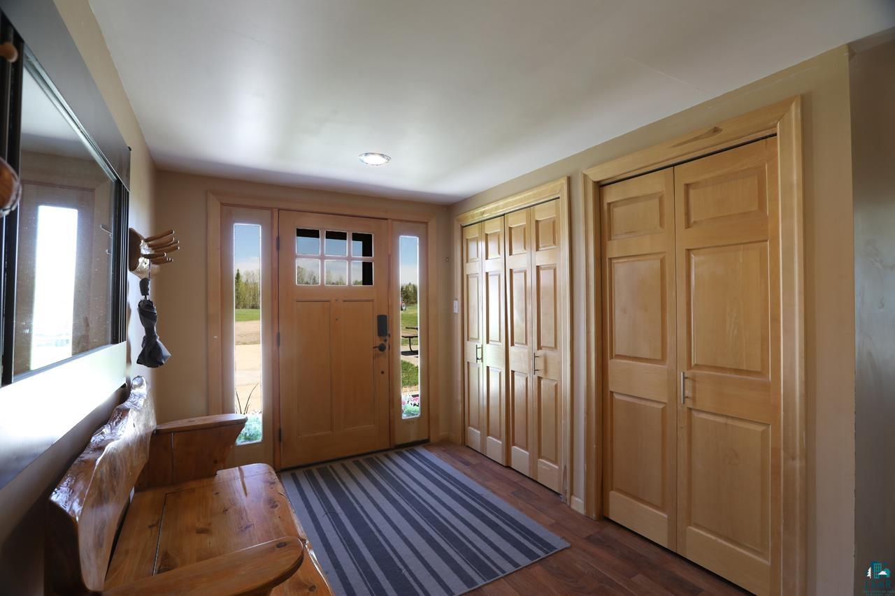 10362 Arkola Road Meadowlands, MN 55765 - Photo 13 of 30 Foyer entrance featuring wood finished floors