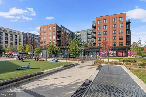 a room with pool table and outdoor seating