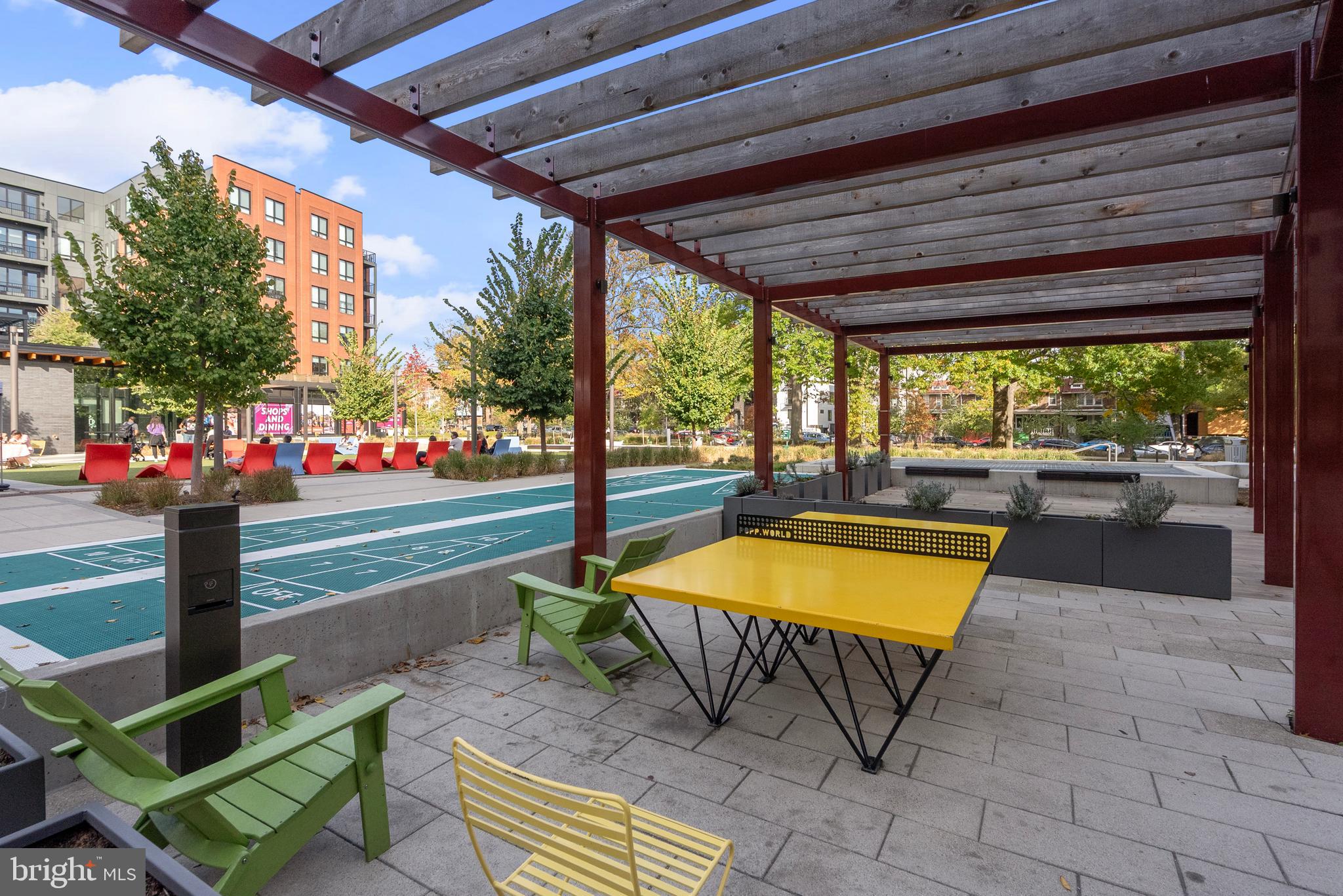 7175 12th Street Northwest, Unit 214 Washington, DC 20012 - Photo 48 of 49 a room with pool table and outdoor seating