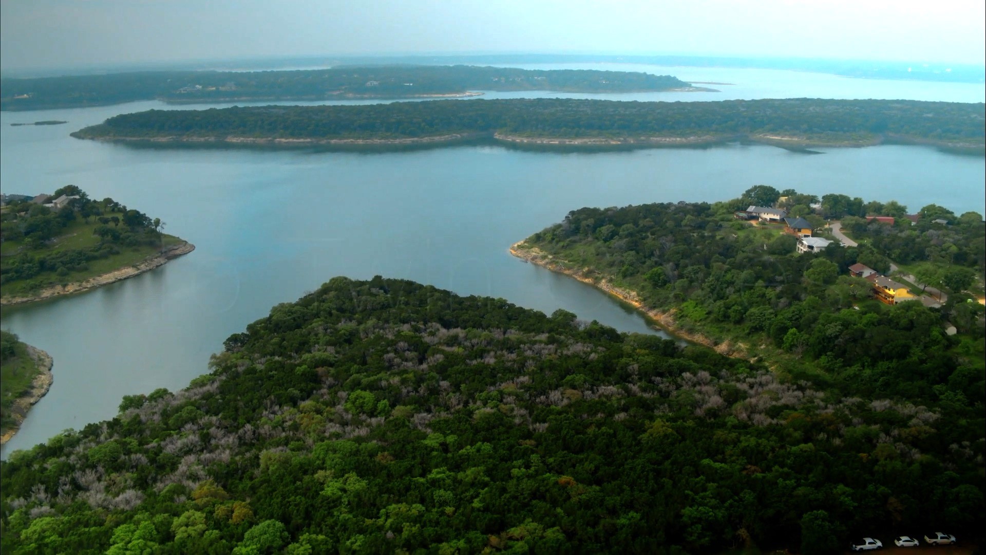 a view of a lake with a outdoor space