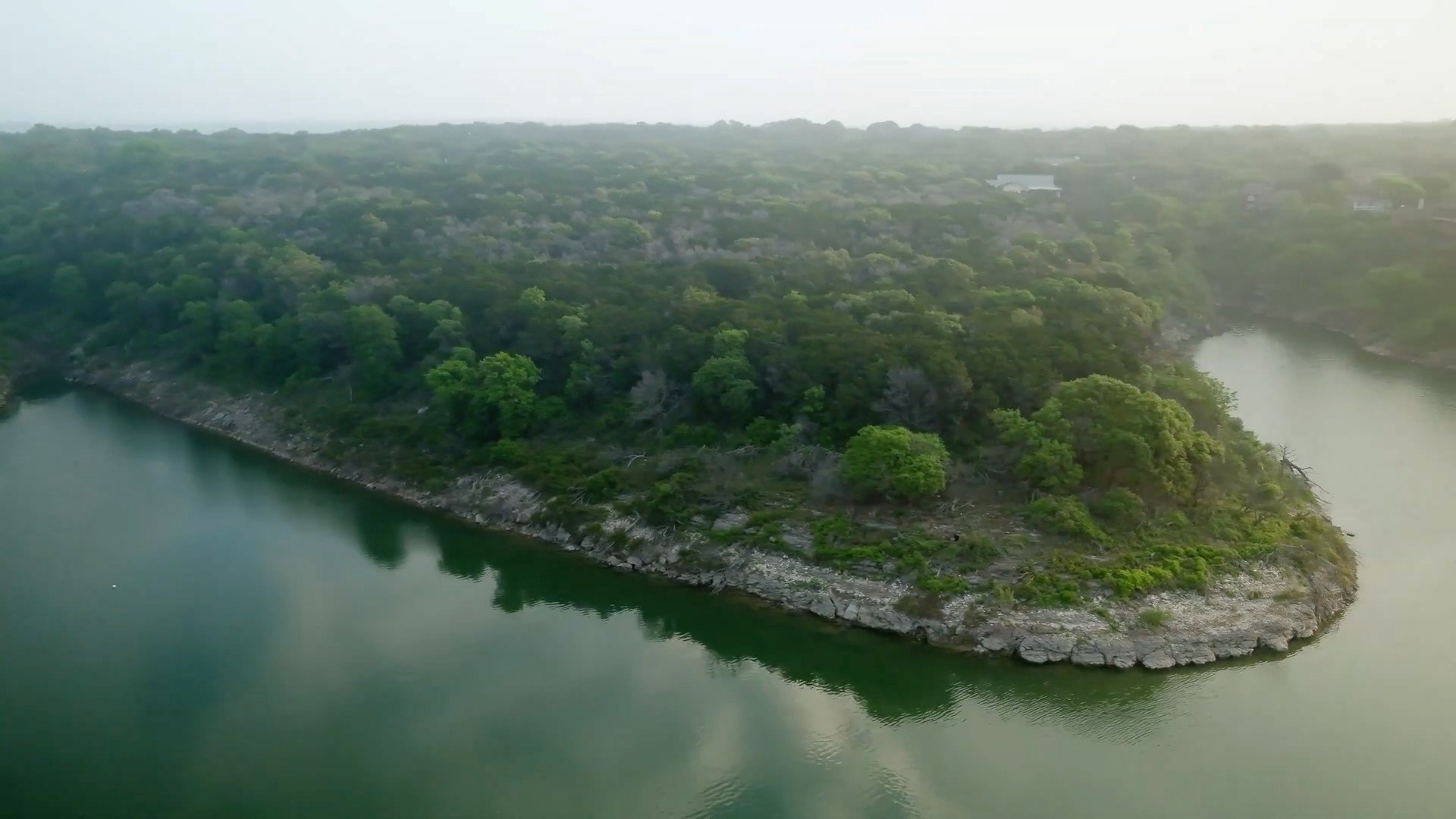 Tbd Morgan's Point Road Belton, TX 76513 - Photo 9 of 13 a view of a lake with a mountain in the background