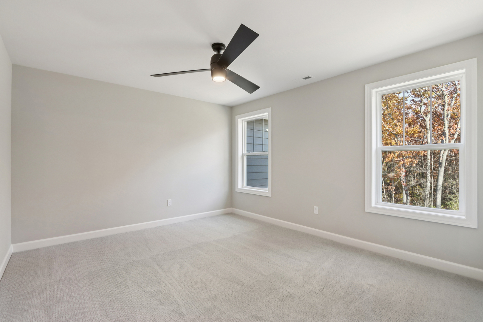 39-w910 Catlin Square Geneva, IL 60134 - Photo 16 of 18 wooden floor in an empty room with a window