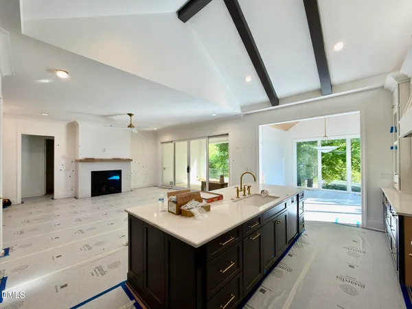 a kitchen with a stove and a sink
