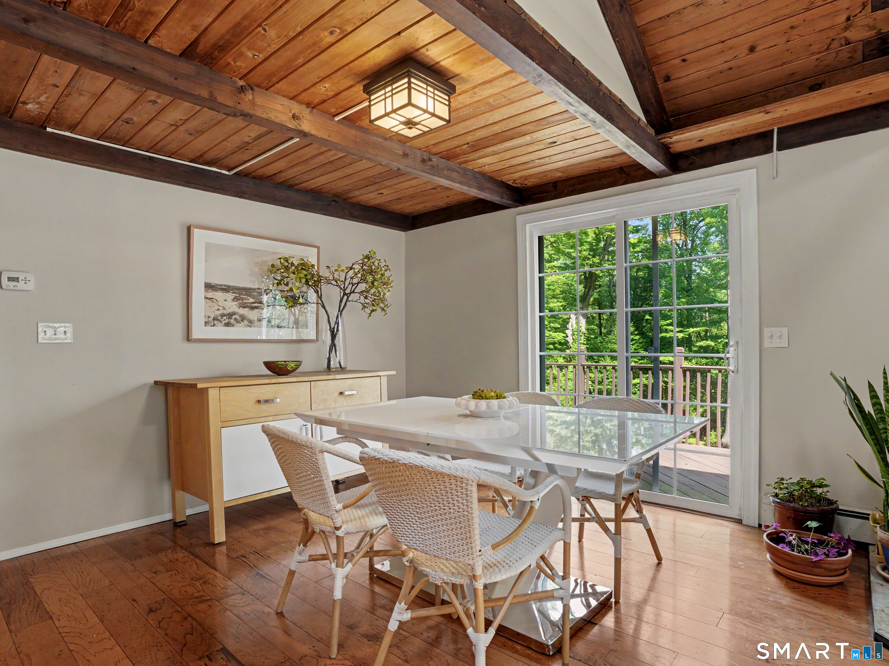 252 Bennetts Farm Road Ridgefield, CT 06877 - Photo 9 of 40 The adjacent kitchen area, has a lovely eating area that overlooks the deck...
