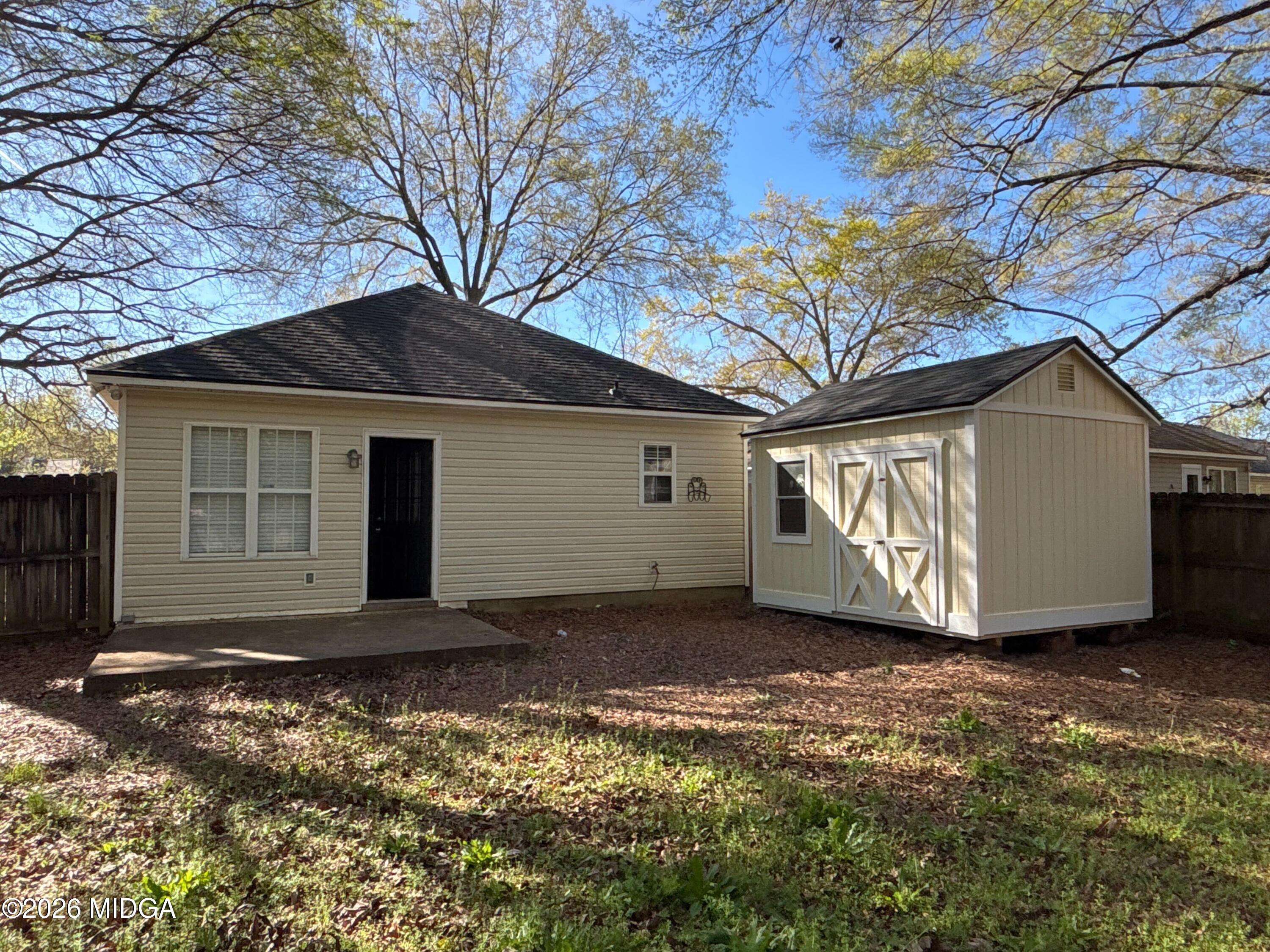 404 Dunmurry Place Warner Robins, GA 31093 - Photo 17 of 18 a view of a house with a yard