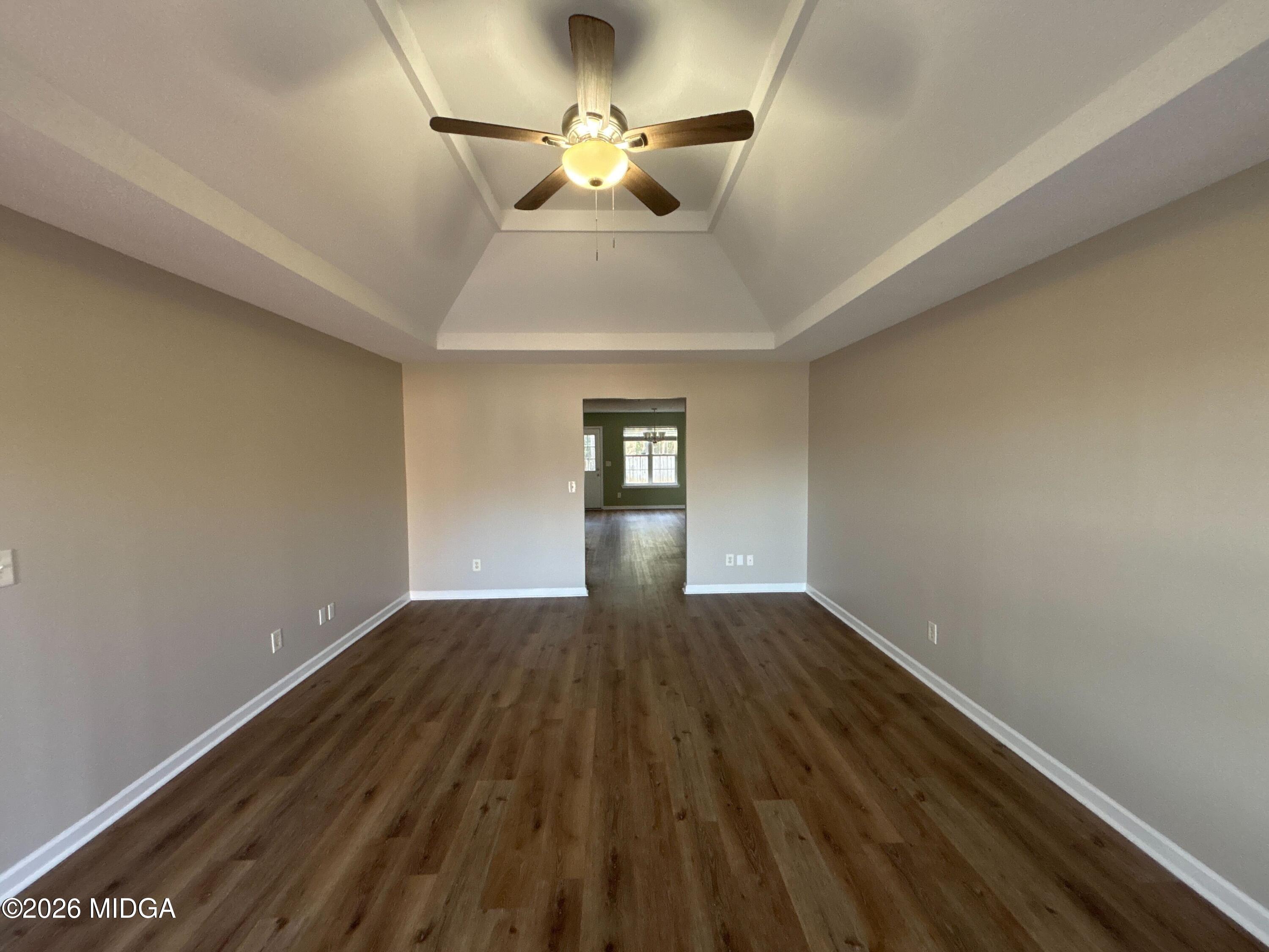 404 Dunmurry Place Warner Robins, GA 31093 - Photo 2 of 18 a view of empty room with wooden floor