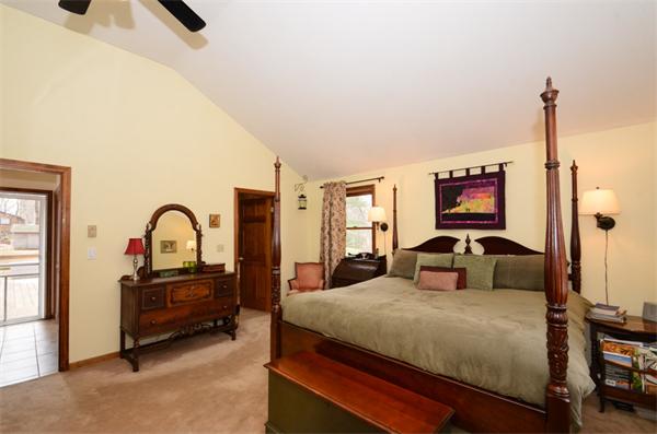 8 Belmore Road Merrimac, MA 01860 - Photo 11 of 22 a bedroom with a bed and a dresser next to a window