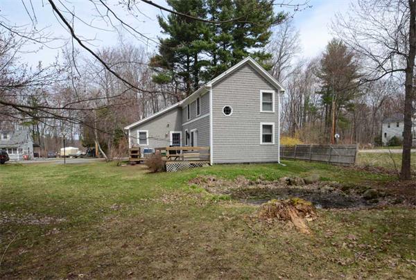 8 Belmore Road Merrimac, MA 01860 - Photo 19 of 22 a view of a house with a yard