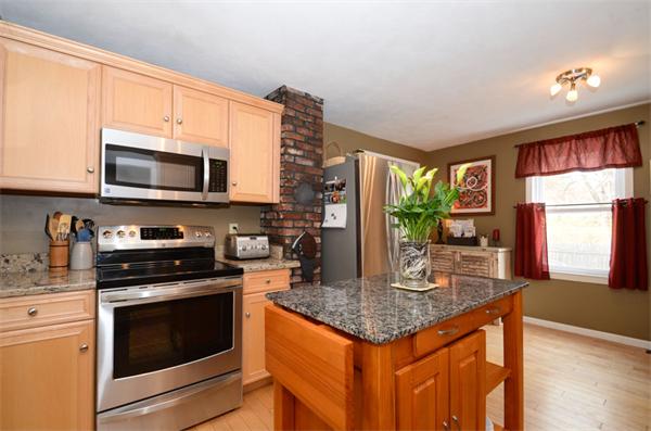 8 Belmore Road Merrimac, MA 01860 - Photo 6 of 22 a kitchen with stainless steel appliances granite countertop a stove top oven a sink and a microwave