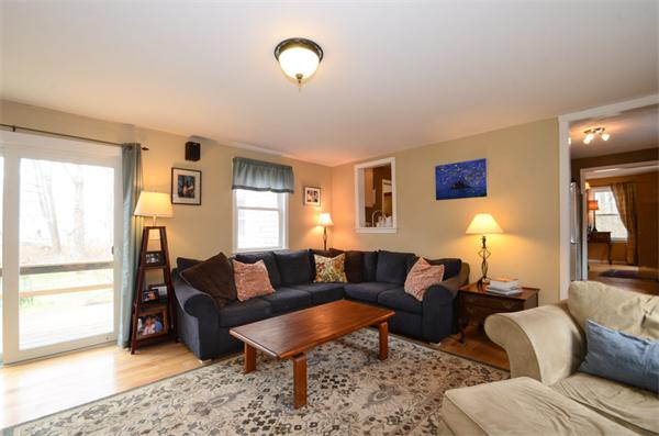 8 Belmore Road Merrimac, MA 01860 - Photo 8 of 22 a living room with furniture a lamp and a window