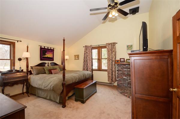 8 Belmore Road Merrimac, MA 01860 - Photo 10 of 22 a spacious bedroom with a bed and wooden floor