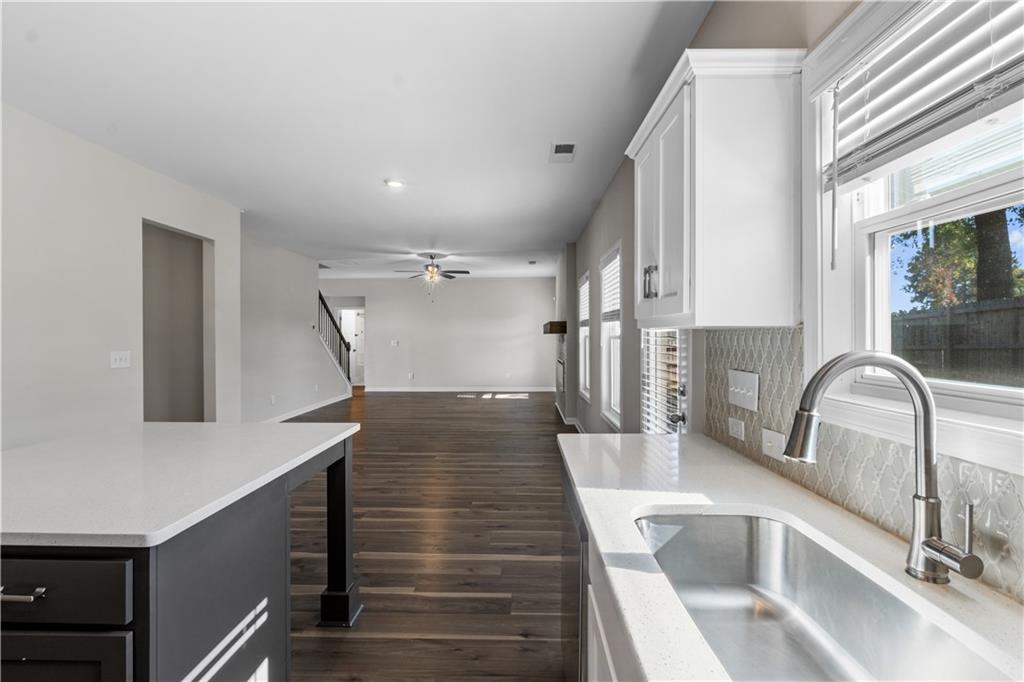 150 Cedar Pk Way Carrollton, GA 30117 - Photo 11 of 37 a kitchen with cabinets and window