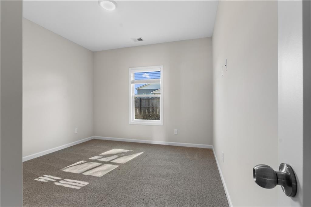 150 Cedar Pk Way Carrollton, GA 30117 - Photo 14 of 37 a view of a room with a window