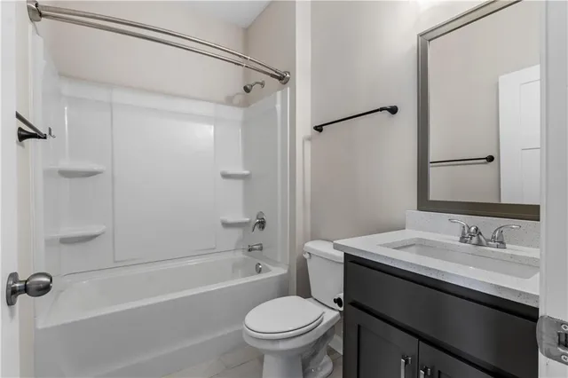 a view of an entryway with wooden floor and stairs
