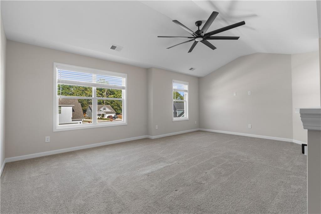 150 Cedar Pk Way Carrollton, GA 30117 - Photo 18 of 37 wooden floor in an empty room with a window