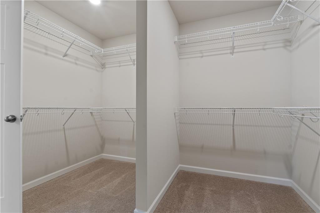 150 Cedar Pk Way Carrollton, GA 30117 - Photo 24 of 37 a view of a room with racks on the wall