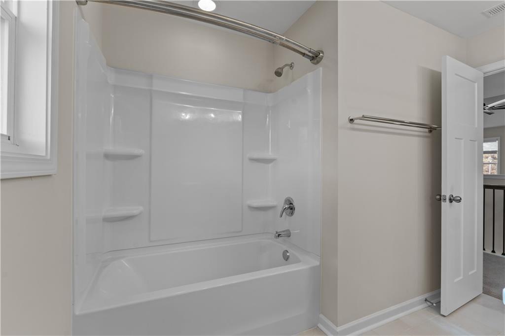 150 Cedar Pk Way Carrollton, GA 30117 - Photo 29 of 37 a bathroom with a bathtub