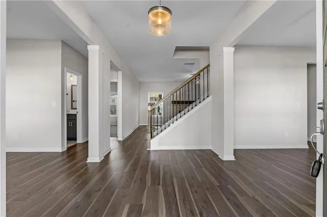 a view of entryway with wooden floor