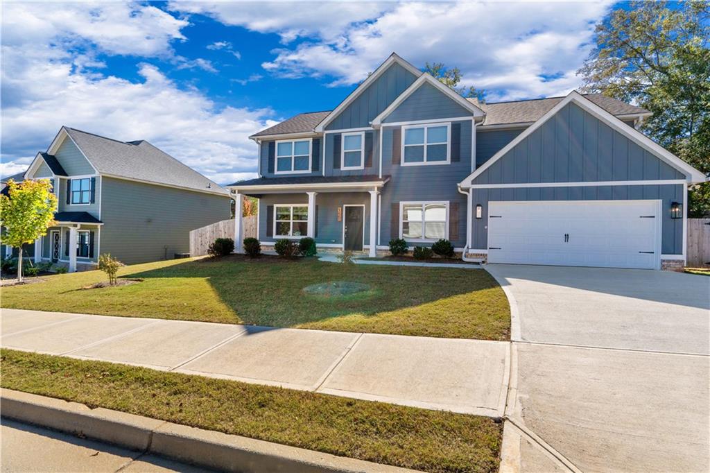 150 Cedar Pk Way Carrollton, GA 30117 - Photo 36 of 37 a front view of a house with a yard