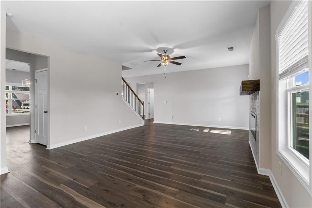 150 Cedar Pk Way Carrollton, GA 30117 - Photo 9 of 37 wooden floor in an empty room with a window