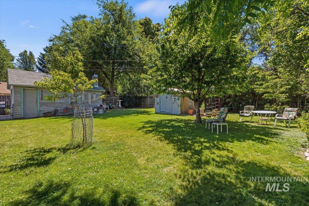 4619 Freemont Street Boise, ID 83706 - Photo 17 of 27 Expansive grassy yard with mature trees providing ample shade