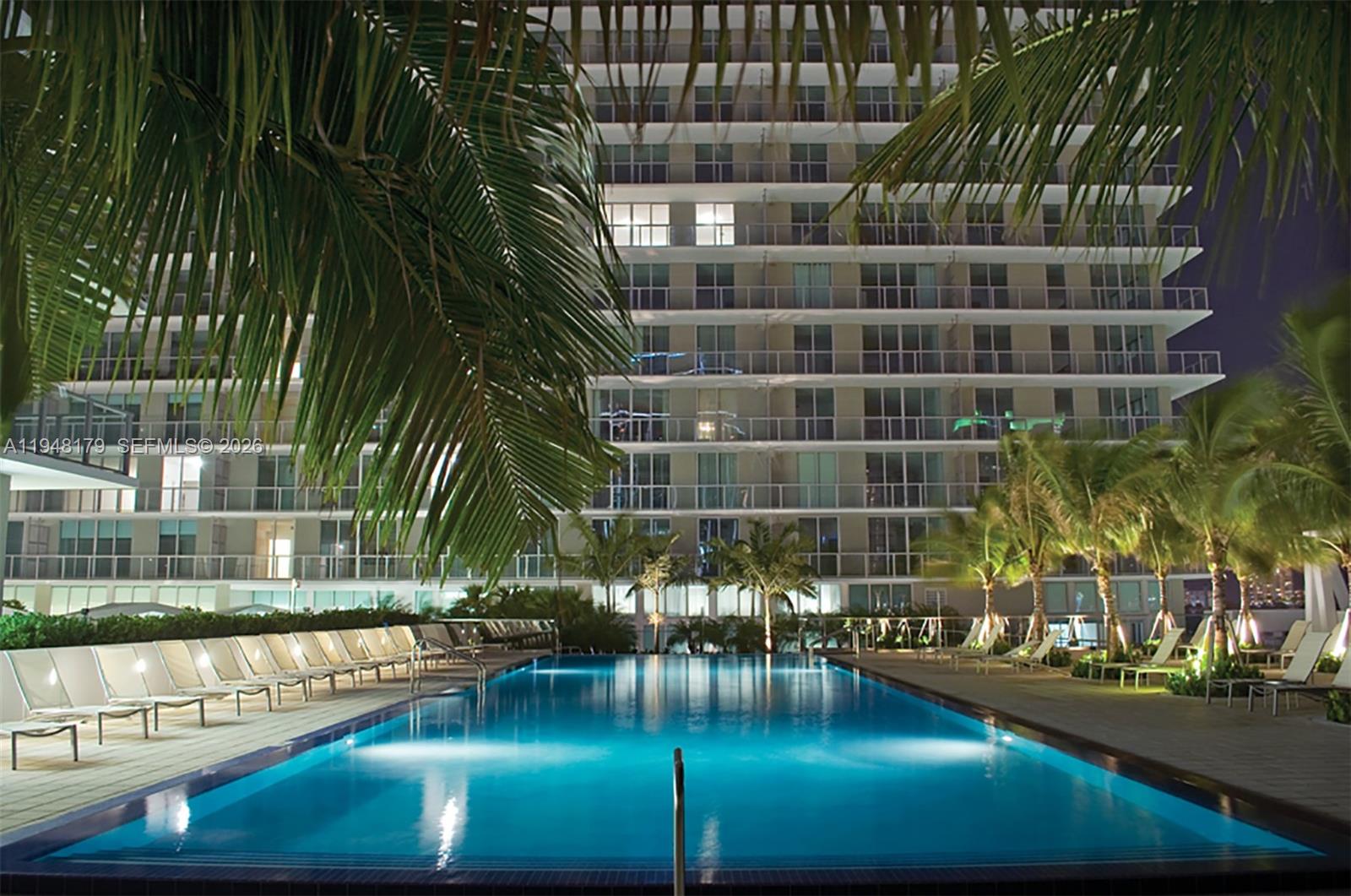 79 Southwest 12th Street, Unit 3008S Miami, FL 33130 - Photo 3 of 11 a view of a swimming pool with a patio