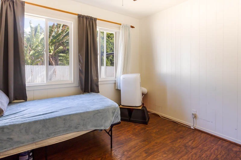 4541 Panihi Road Kapaa, HI 96746 - Photo 12 of 30 a bedroom with a bed and a window
